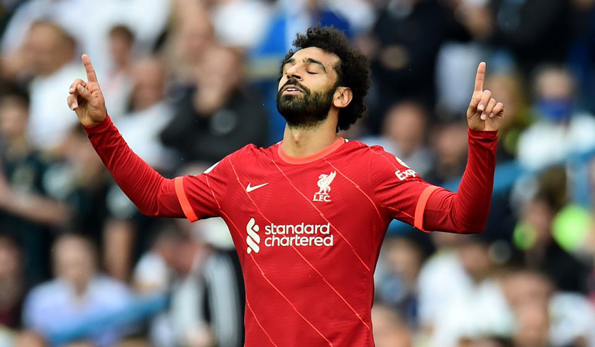 Salah joins 100 club as Liverpool win at Leeds in match marred by Elliott injury